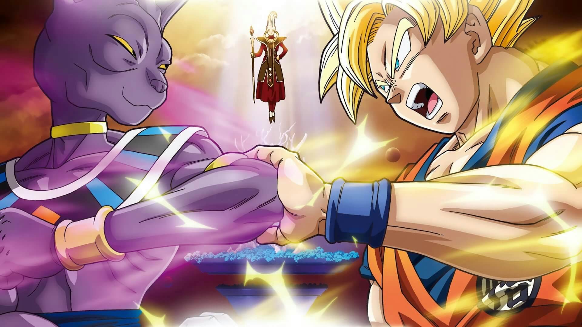 Goku e Bills se encarando com Whis ao fundo na imagem